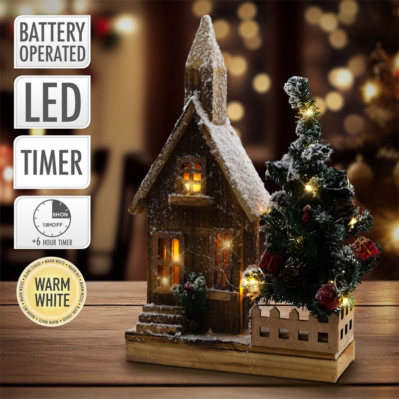 Deko Weihnachtshaus schneebedeckt mit LED Beleuchtung 44 x 27 cm aus Holz Deko Weihnachtshaus schneebedeckt mit LED Beleuchtung 44 x 27 cm aus Holz